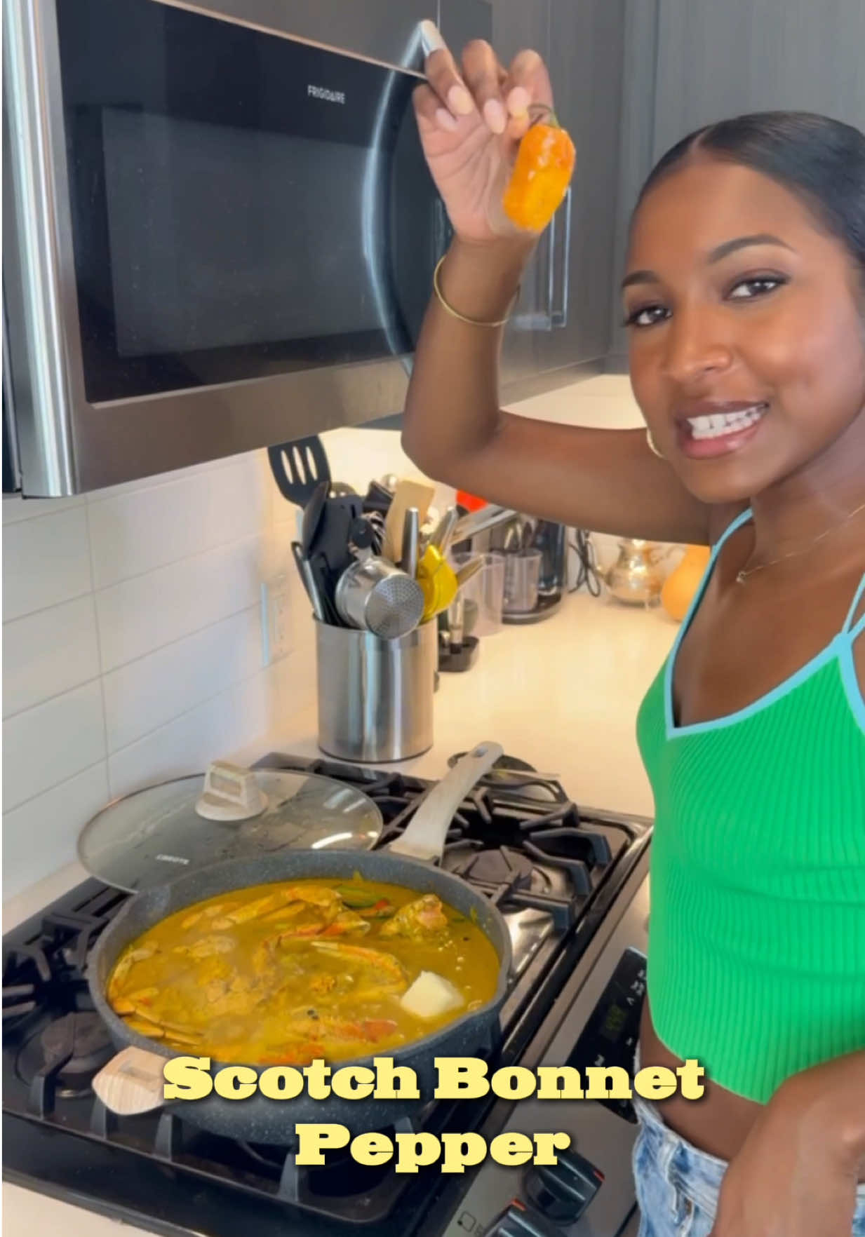 A post by @thecarlaciagrant on TikTok caption: Missed me? 😉 I had to get back in the kitchen for y’all. Today I’m bringing some West Indies flavor to your screen 😋