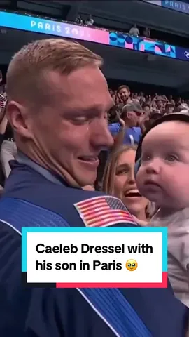 A post by @nbcolympics on TikTok caption: On this Father’s Day, we remember one of the most heartwarming moments of the Paris Olympics as Caeleb Dressel celebrated winning gold with his young son, August. ❤️ #parisolympics #FathersDay #family 