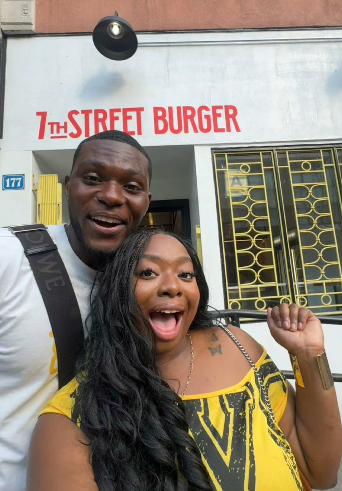 A post by @therealtati on TikTok caption: trying the best smash burger in NYC w/ @tyshon  Do you think this is the best smash burger? #nyc #tatitriesthings #foodie 