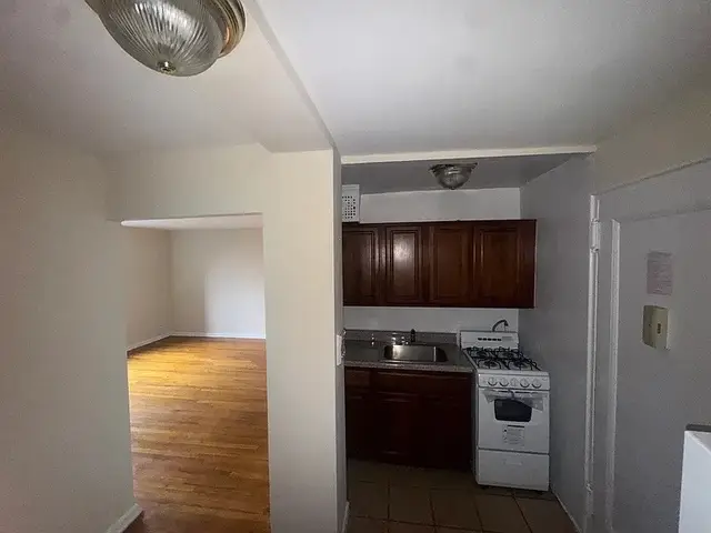 A post by @crownrealestatecompany on TikTok caption: 2 Bedroom Apartment  Rent: $1,400 Per Month Including Utilities  Located at 139-22 86th Ave #A, Jamaica, New York Description: Modern 2-Bedroom Gem in Prime Jamaica, Queens Location Experience comfort and convenience in this spacious 2-bedroom apartment, featuring a sleek modern kitchen, gleaming hardwood floors, and generous closet space. Ideally situated near public transit, top dining, shopping, and green spaces—this is city living at its best. Don’t miss this rare opportunity! To schedule an appointment for viewing, text me at +1 (326) 214-0928  #apartmenthunting #curbappeal #dreamhome #forrent #forsale #home #homesforsale #househunting #justlisted #justlisted + city. #justsold #midcenturymodern #newhome #newlisting #petfriendly #propert #realestateforsa #renovated #turnofthecentury #victor 