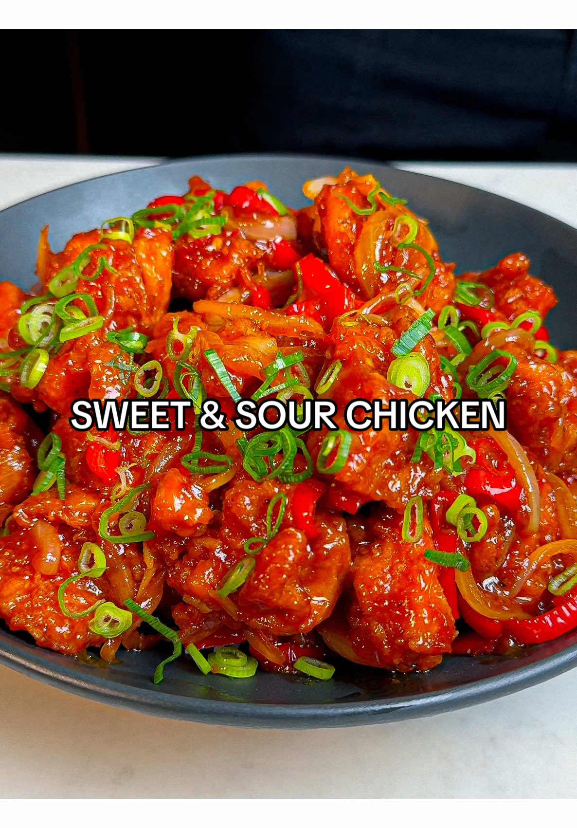 A post by @samseats on TikTok caption: Sweet & Sour Chicken 🍗  The best pick for a Chinese takeaway?! Full recipe now up on my Substack, link in bio ❤️ #cooking #asmr #datenight #comfortfood #takeaway #fakeaway #chinese #chicken 