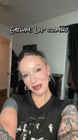 A post by @arachnisophia on TikTok caption: Quick and easy lip combo✨  @Fenty Beauty Major Flex Gloss Bomb @MakeUpForEverUSA Limitless Brown Pencil #altstyle #90salt #altmakeup #lipcombo #fentyglossbomb #altgoth #softaltmakeup #90sgrunge #makeuptutorial #liptutorial 