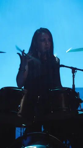 A post by @kamikehoe on TikTok caption: I can’t feel a thing … #NewMusic #altrock #drummergirl 