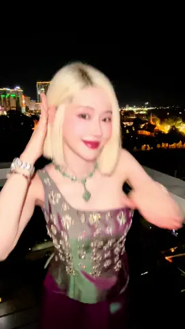 A post by @deejaysoda on TikTok caption: I was dancing under the night sky in Phnom Penh when suddenly lightning struck and it scared me 🥹⚡️ #djsoda #dj소다 