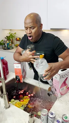 A post by @realtipsybartender on TikTok caption: Kitchen Sink Jungle Juice #cocktails #drinks #kitchen #sink