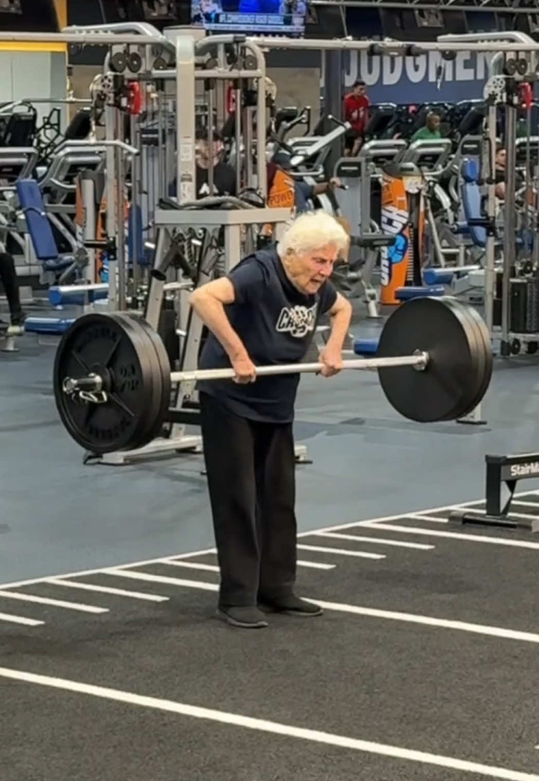 A post by @rosssmith on TikTok caption: If your deadlift is weak, Granny’s taking your spot—she didn’t come to @Crunch Fitness to wait around #fitness 