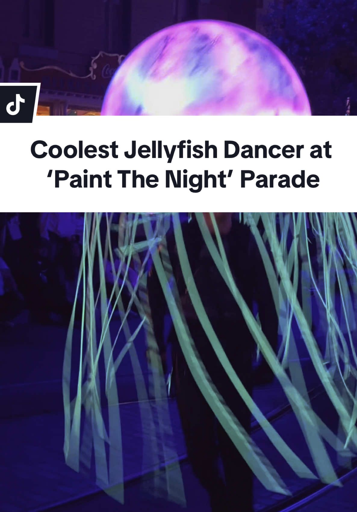 A post by @hegoesbygian on TikTok caption: Showing extra love to these jellyfish dancers at ‘Paint The Night’ parade at Disneyland…especially this one. Probably the coolest and most confident jellyfish dancer. Dancing with so much rhythm. Which ensemble dancers you want to give a shout out to? #disney #disneyland #disneylanddancer #disneylanddancers #paintthenight #paintthenightparade #jellyfishdancer #disneylandresort #disneylandcalifornia 