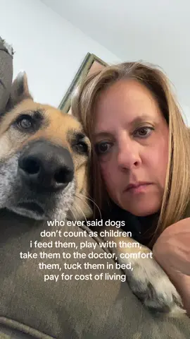 A post by @ on TikTok caption: This is my child #fyp #foryoupage #dogsoftiktok #cute #furbaby 