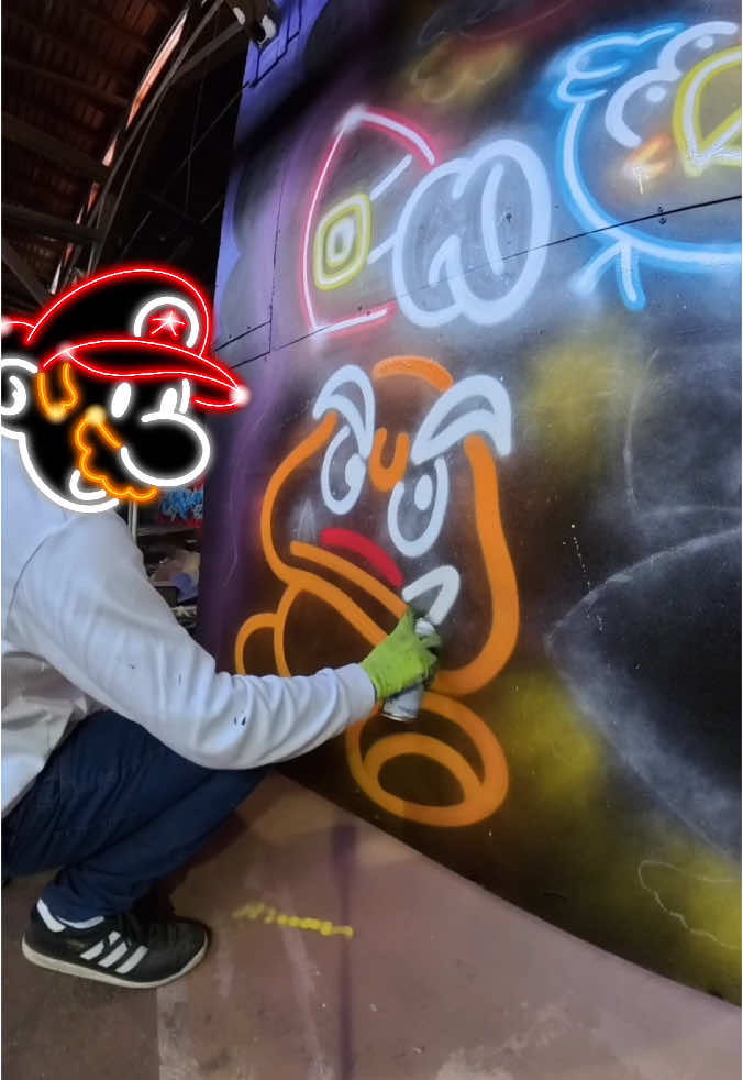 A post by @fatcapsprays on TikTok caption: Jump over the Goomba! Big thanks to wasa Graffiti Landia for the spot! #art #streetart #goomba #painting 