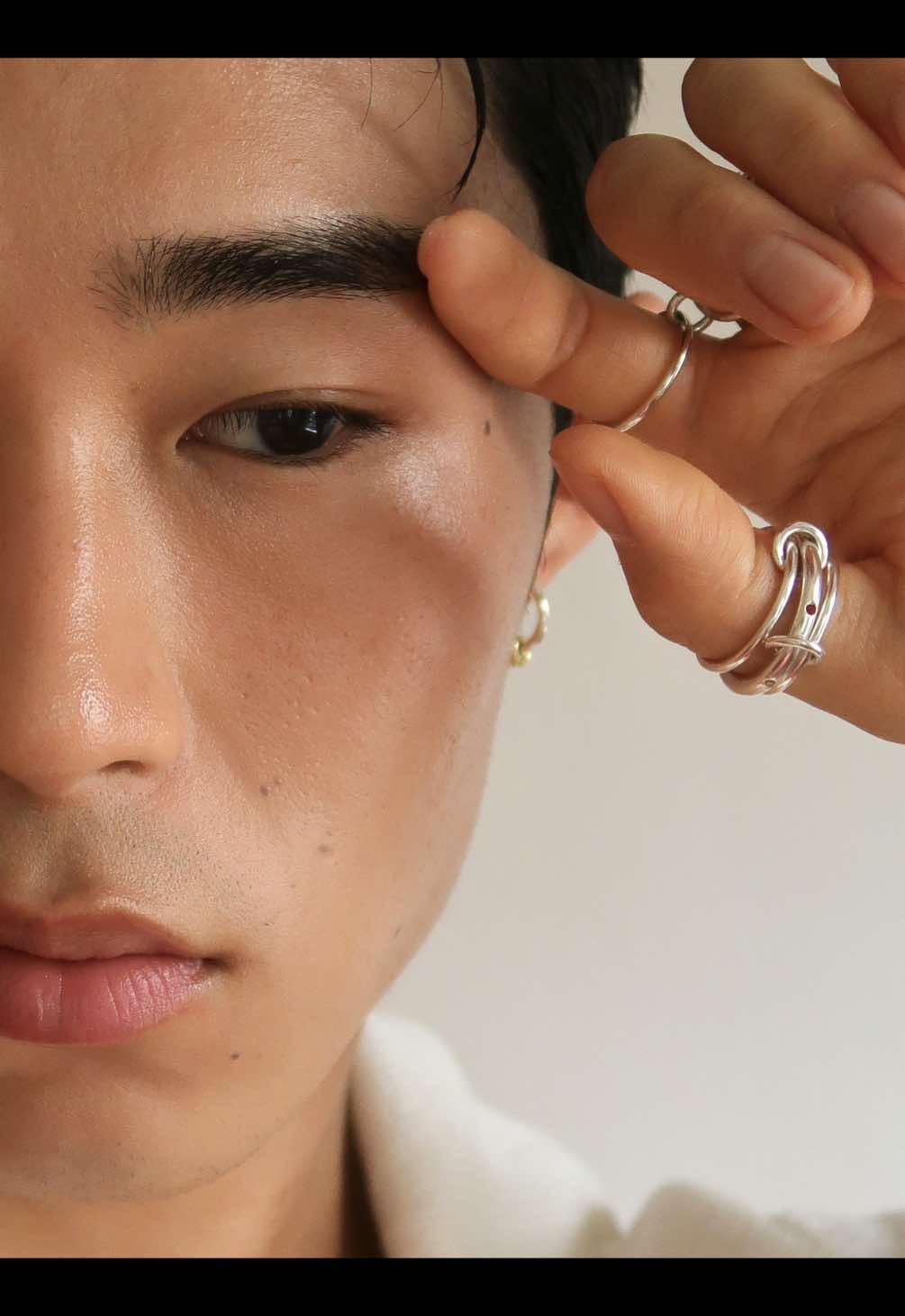 A post by @theedwardpark on TikTok caption: Making Pride an everyday reminder with @Spinelli Kilcollin and their Pride Ring. The perfect personal and timeless way to complete my daily rings #spinellikilcollin #spinellikilcollinpartner #silverjewelry #jewelrytiktok #925sterlingsilver 