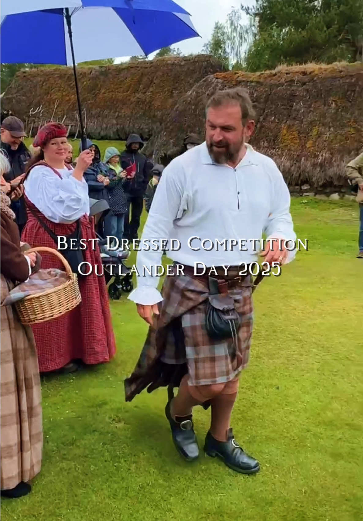 A post by @andy_highlander on TikTok caption: Congratulations to Maria @craft.lady.m  for winning the best dressed competition at Outlander Day 2025! What an amazing turn out it was, despite the showery weather. It was great to see so many people in traditional clothing and it was my pleasure to be a judge for the competition again. Until next year! #outlander #outlanderday #clairefraser #cosplay #andythehighlander #scotland #highlandertours 