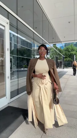 A post by @peakmill_ on TikTok caption: TT chose the song 🤷🏾‍♀️.                                                                                                                              @asos dress and blazer.                                                                                                    @Aislin Jesalin bag