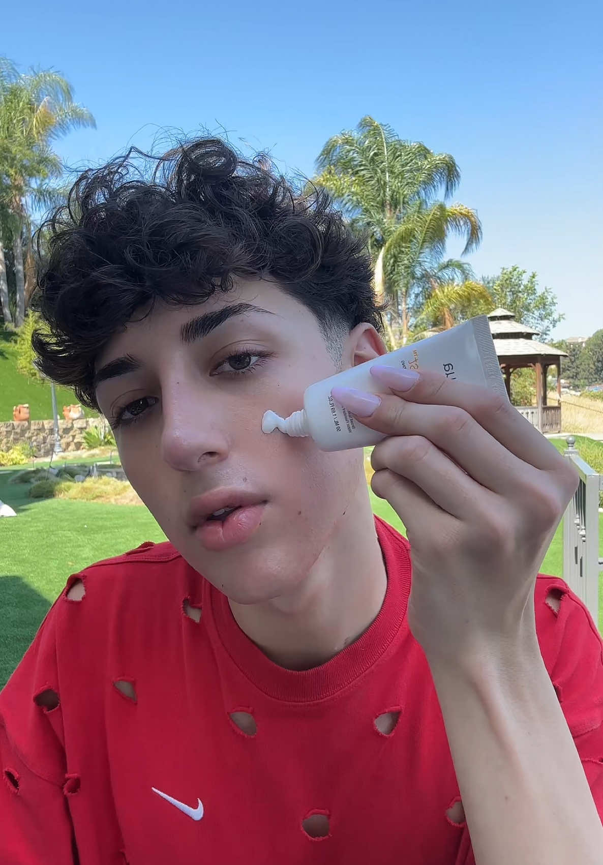 A post by @daus_mendoza on TikTok caption: Quick GRWM in my backyard☀️ I miss my beauty room🥺 my new one is so close to being done!  @anua_global  @about-face beauty  @Hourglass Cosmetics  @Kosas  @ONE SIZE BEAUTY  @Glamlite 🫢👀 @Rare Beauty 