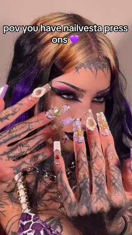 A post by @m0rguekitty on TikTok caption: @NailVesta 💜 