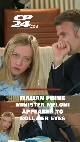 A post by @cp24breakingnews on TikTok caption: Seated around the summit table ahead of Carney’s official opening remarks, Italian Prime Minister Giorgia Meloni appeared to roll her eyes during an interaction with French Prime Minister Emmanuel Macron.   With all the leaders’ microphones muted, Meloni can be seen leaning over while Macron whispers something to her behind a closed fist, prompting Meloni to look up at him. The two then give slight nods, and she makes a thumbs-up gesture.   About 30 seconds later, Macron is again seen whispering to Meloni, before she looks up at him and rolls her eyes. The camera then cut away.   With muted microphones and shielding their mouths, it’s unclear what the French president said to elicit the Italian prime minister’s response. #cp24 #news #G7