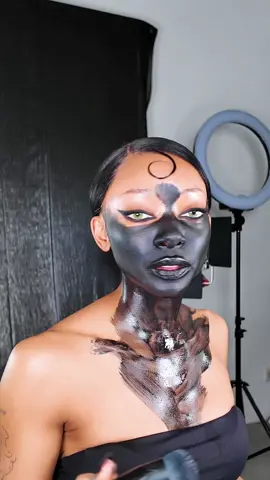 A post by @nyane on TikTok caption: Behind the scenes of my Black panther look, the last and final look from my Wild series 🖤 who wants to see the final result? #bts #foryou #blackpanthermakeup #jaguarmakeup