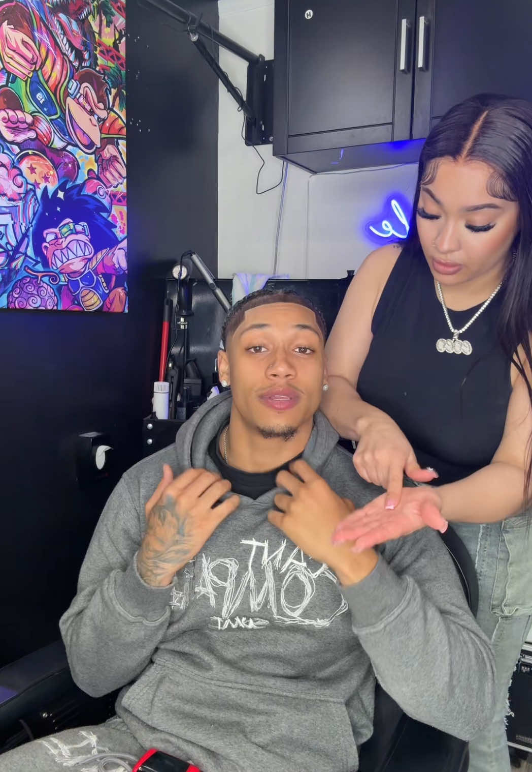 A post by @coco.shinele on TikTok caption: Time to pay up lil twin 💈@juanski⛷️ #cocoshinele #fyp #femalebarber #atl 