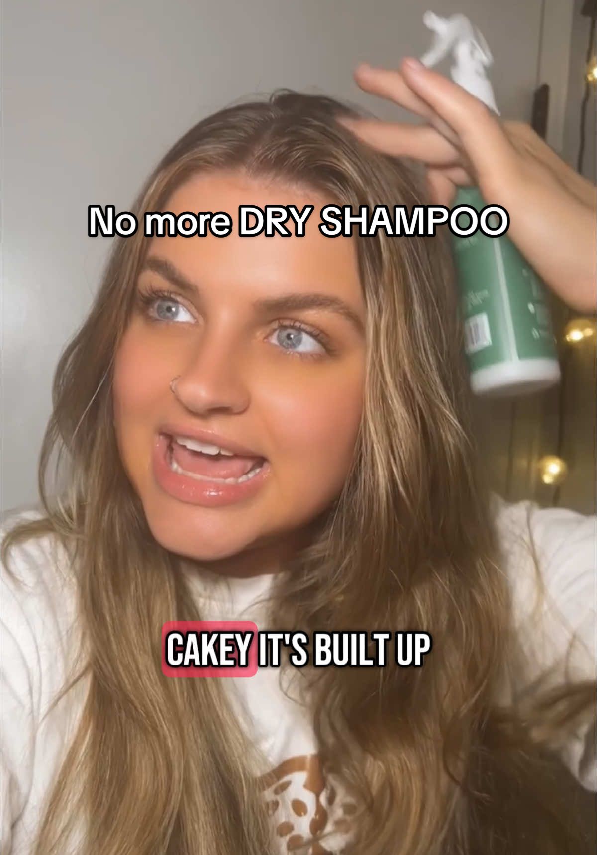 A post by @xosaraahxo on TikTok caption: Dry shampoo is out - shower less shampoo is in 🛁🫧🧴#dryshampoo #showerlessshampoo #dryshampoohack #fyp #greasyhair #greasyhairtips #relatable 