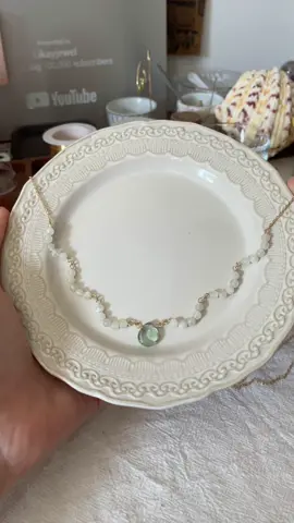 A post by @likayjewel_diylilylin on TikTok caption: Moonstone lace and green fluorite teardrop necklace 🌿✨🌱#handmadejewelry #tutorial #jewellery #weddingjewellery #necklaces #necklacemaking #foru #handmadenecklace 