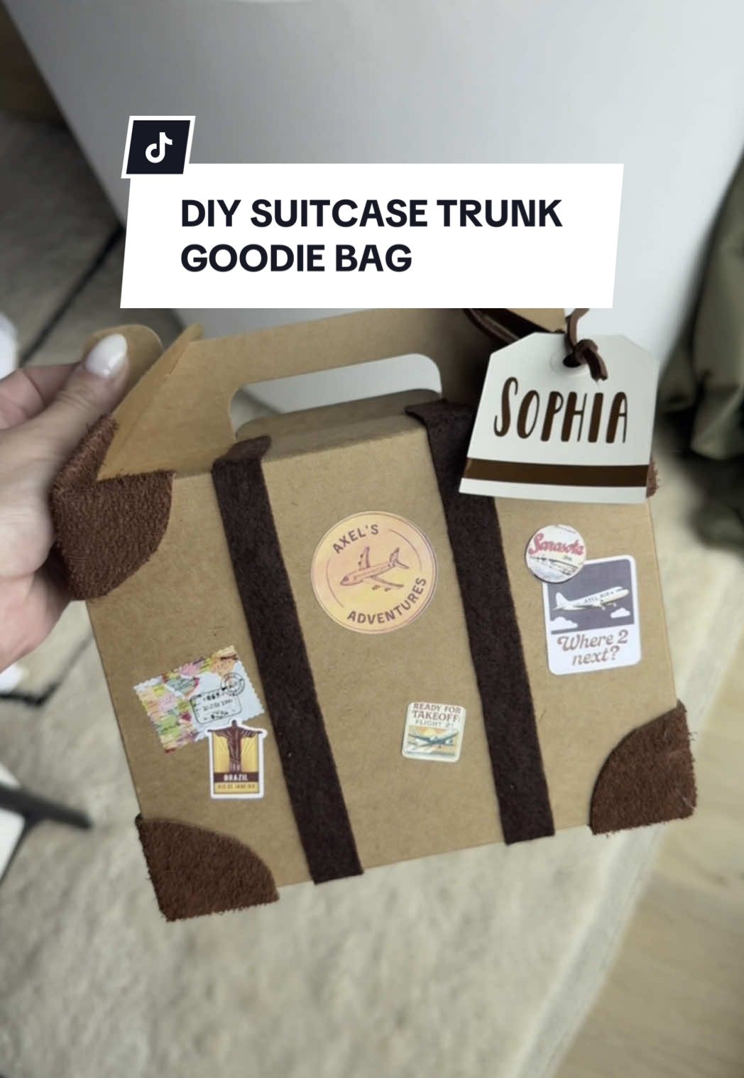 A post by @the_avantgarde on TikTok caption: These customized suitcase goodie bags were so easy to make, but now idk if I should make the luggage tags colorful or cohesive with the suitcases!? #diy #crafts #partydecor #easycrafts 