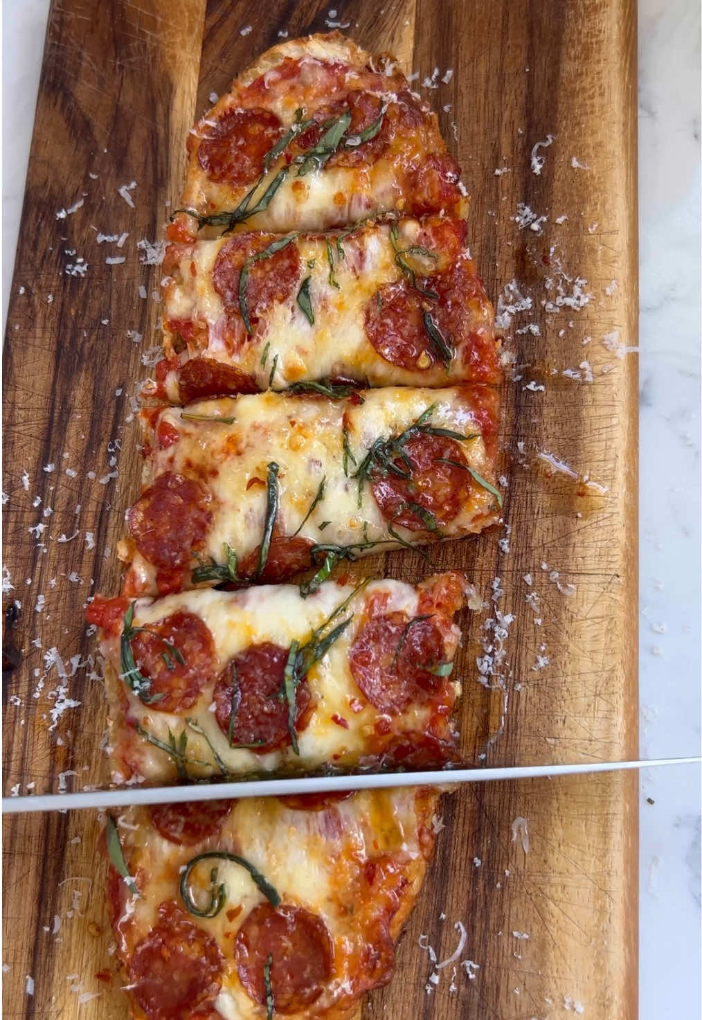 A post by @_lacebakes_ on TikTok caption: Replying to @Robin Suntheimer have a leftover sub roll? Turn it into a super quick pizza - cut in half and top each side with sauce, cheese and toppings and bake for about 12 minutes at 400F/200C 🍕  This one was made on my Subway Dupe Italian Herb & Cheese rolls, full recipe/method posted a couple weeks ago! #pizzatok #Pizza #subwaybread 