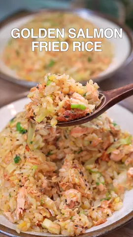 A post by @tiffycooks on TikTok caption: 20 MINUTES GOLDEN SALMON FRIED RICE #dinner #salmon 