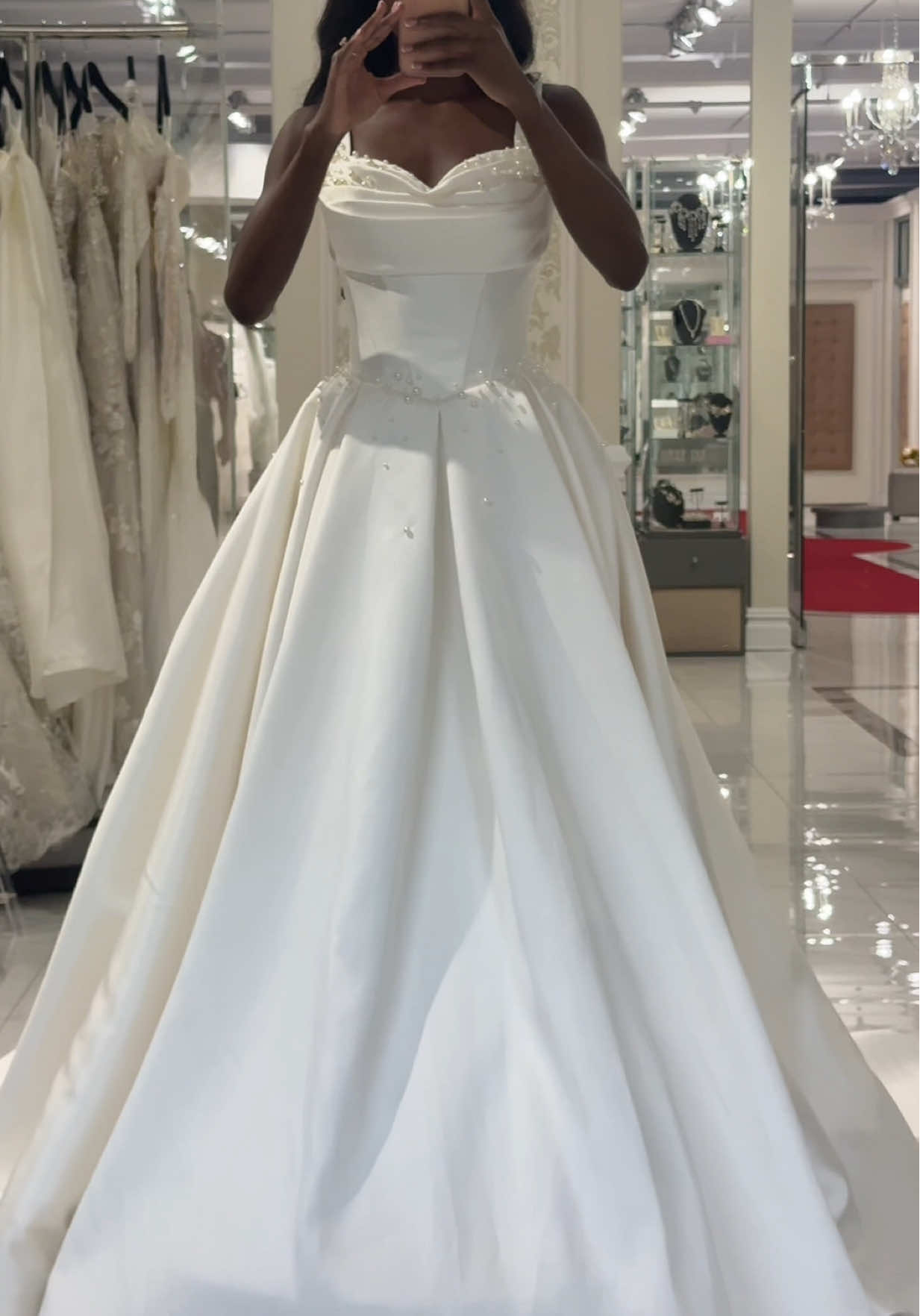 A post by @ginab.xo on TikTok caption: Wedding dress shopping 💍  4 stores and over 30 dresses later, still haven’t found the one yet 🥹 do I keep looking or should I just pick something? 😓 #wedding #weddingdress #weddingdressinspo #bridal #2025bride #bridalstyle 