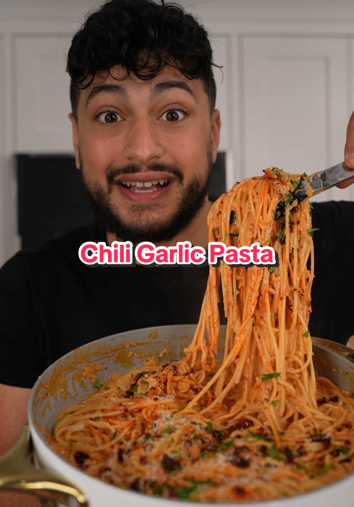 A post by @thegoldenbalance on TikTok caption: Chili Garlic Pasta 😩  Recipe: 2 tbsp butter  1 large yellow onion  3 shallots  2 tsp chili oil  6-8 cloves garlic, minced  Salt to taste  2 tbsp rice vinegar  1 tbsp chili crunch  1 pint heavy cream  2-3 oz Parmesan cheese, grated 16 oz dry spaghetti  Garnish: Cilantro  Chili crunch  Parmesan cheese