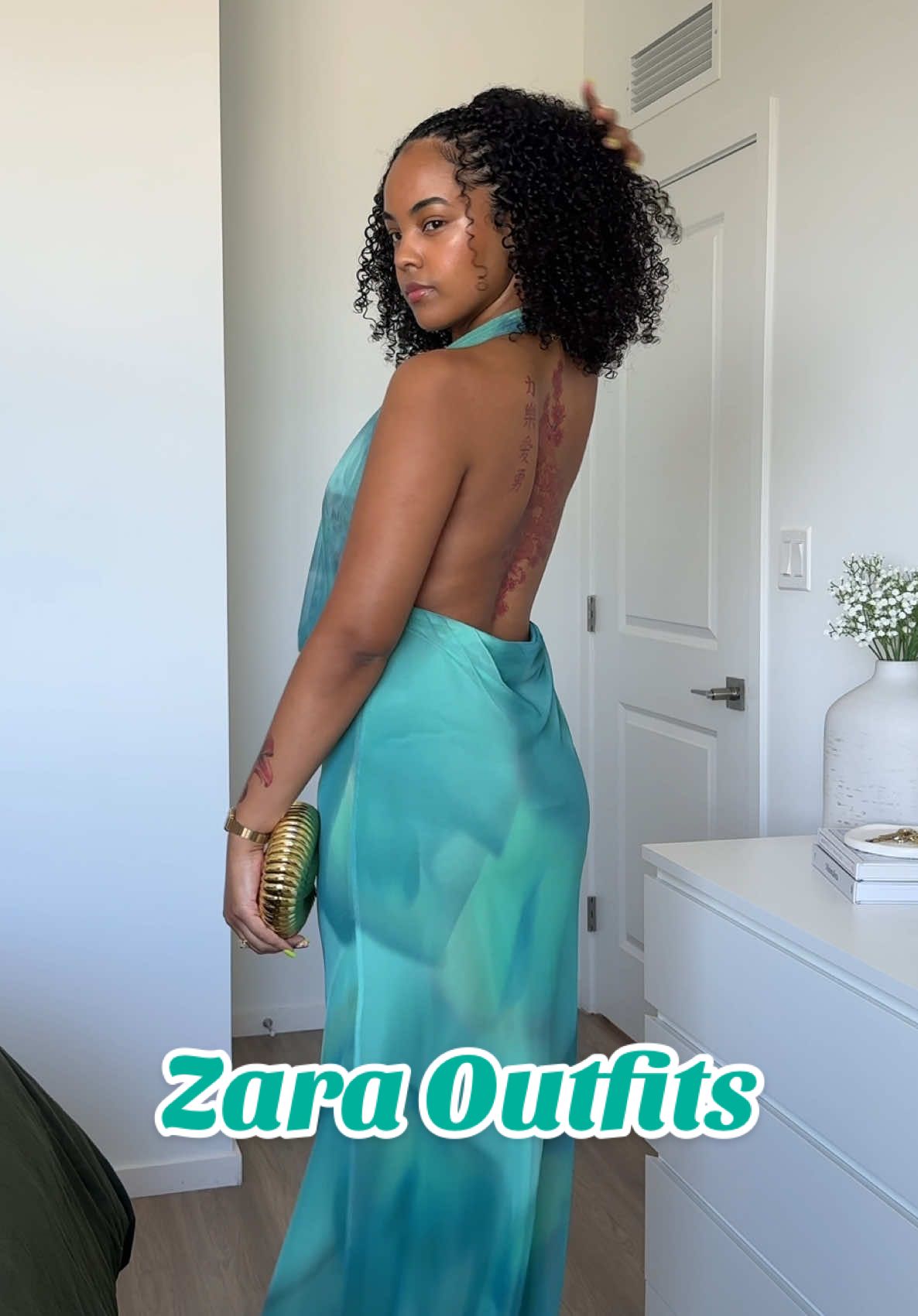 A post by @michixo__ on TikTok caption: Zara outfit inspo 🌴 find outfit deets in b!0 ✨ #outfit #inspiration #Summer #zara #hairstyle #haul #vacation #curlyhair #hair @ZARA 