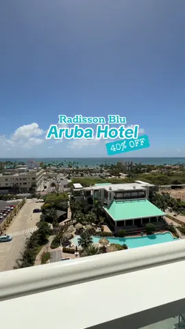 A post by @morgsvstheworld on TikTok caption: 🇦🇼Aruba Hotel: Radisson Blu 🇦🇼 #aruba #thingstodoaruba #arubahotel #BluAruba #FeelTheDifference #TheArubaEffect #OneHappylsland #travelvlog #travelvibes