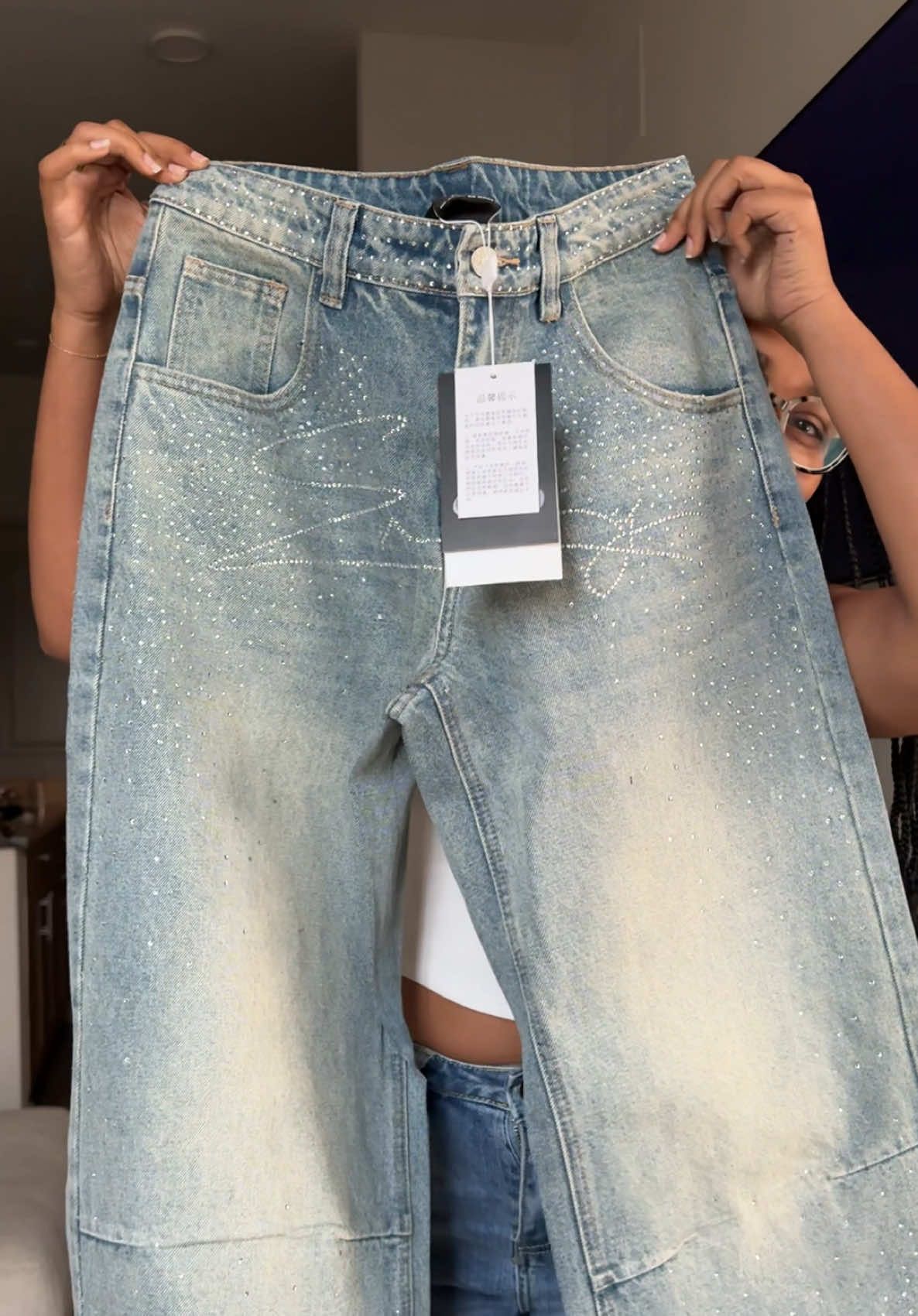 A post by @joiya.lanae on TikTok caption: They’re PERFECT! Store: @baroquegalleria , Size:30 , I’m 5’2 and 130 lbs #jeans #jeanstryon #sparklejeans #concertoutfit 