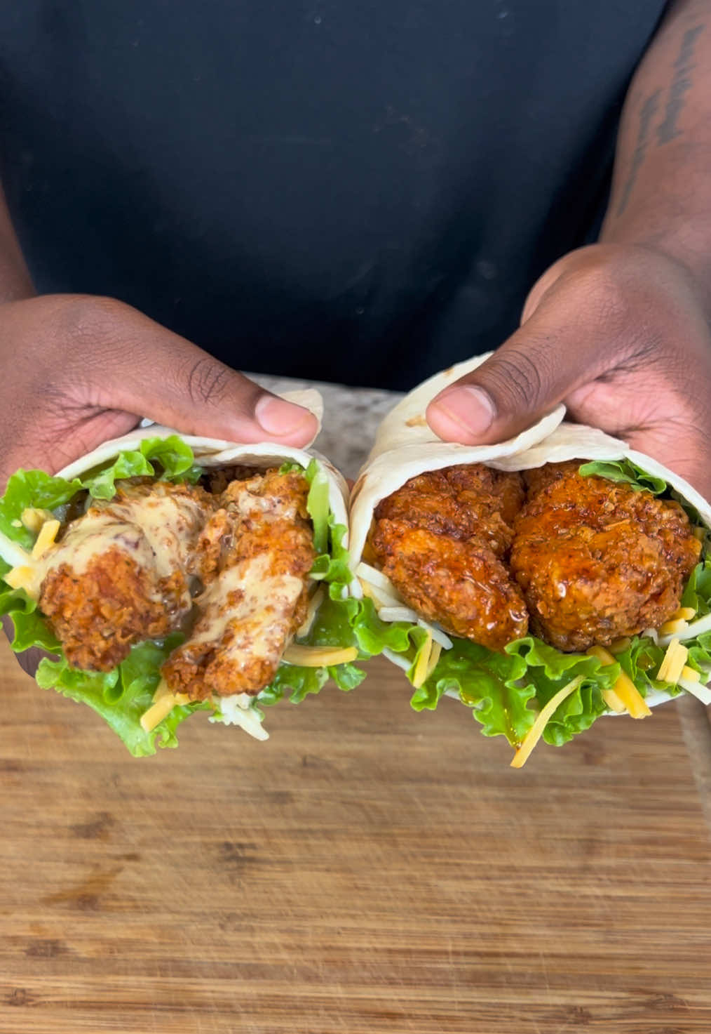 A post by @eatwitzo on TikTok caption: Homemade Crispy Chicken Wraps! Who else remembers the classic snack wraps from mcdonalds back in the day? Take a trip down memory lane and make them at home! Enjoy!    Full Ingredient list:  2 lb chicken tenders  1/2 cup hot sauce  3 large eggs  1 packet sazon  1 tsp garlic powder 1 tsp onion powder 1 tsp black pepper 1 tsp dried oregano  1/2 tsp salt  For flour mixture:  2 cups flour  1 packet sazon  1 tbspgarlic powder 1 tbsp onion powder 1 tbsp  black pepper 1 tbsp dried oregano  1 tbsp cayenne pepper (optional)  2-3 tsp salt (optional) For honey mustard:  3/4 cup mayo  2 tbsp dijon mustard  1/4 cup honey 1/2 tsp smoked paprika  1/2 tsp black pepper  For hot honey:  1/2 cup honey  1/2-3/4 cup hot sauce  2-3 dashes Worcestershire  Lettuce to garnish  Shredded cheese to garnish  Preferred frying oil #snackwrap #honeymustard #eatwitzo 