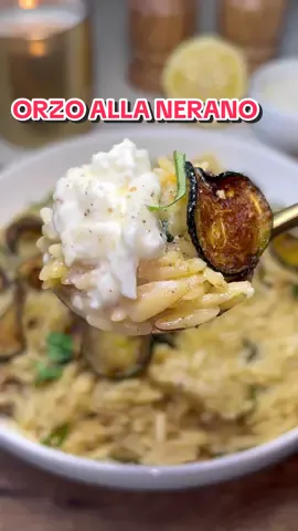 A post by @heresyourbite on TikTok caption: Orzo alla Nerano 🥒 @Stanley Tucci  I turned Stanley Tucci’s favorite pasta — the iconic Spaghetti alla Nerano — into a one-pot orzo version: Orzo alla Nerano!  It’s packed with golden fried zucchini, fresh basil, lots of Parmesan, and a hint of lemon for brightness. Top it with burrata for the ultimate finishing touch and enjoy. Ingredients below — full recipe is linked in my bio! 3/4 cup oil (for shallow frying) 3 garlic cloves, smashed 1–2 small zucchini, thinly sliced into rounds Flaky salt, to taste 1 cup orzo 3 to 3.5 cups vegetable or chicken broth (start with 3 cups, add more as needed) 1–2 tbsp butter 3/4 cup freshly grated Parmesan (or more, to taste) Zest and juice of 1/2 lemon 4–5 fresh basil leaves, torn Black pepper, to taste Pinch of red pepper flakes (optional) Burrata, for serving (optional) #nerano #allanerano #spaghettiallanerano #stanleytucci #pastaallanerano #italian #italianfood #italianpasta #summerpasta #summer #summerfood #summerveggies #zucchini #friedzucchini #orzo #onepot #onepotmeals #onepanmeal #onepan #easyrecipes #foodtok