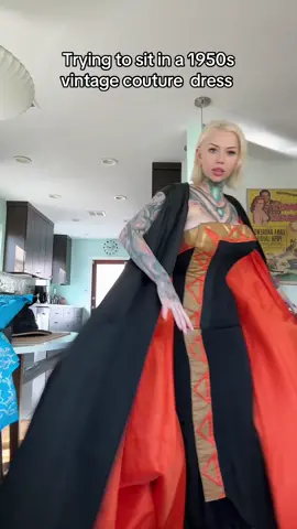 A post by @pinuppixie on TikTok caption: The most amazing dress in my collection ❤️ @Timeless Vixen 