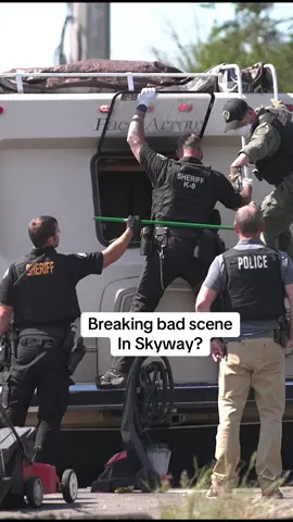 A post by @photogsteve81 on TikTok caption: Earlier today a call for service in connection to a DV situation in Skyway, which was dispatched to @kcsheriff deputies. Eventually SWAT was added as the suspect was uncooperative and it involved a gun. SWAT ultimately made entry and took a suspect into custody. A judge signed a search warrant and less kitted out deputies made entry to see what all was inside. The hazmat gear being worn appears to have been more in connection to the terrible conditions inside the RV and not due to a lab. This RV is in an RV encampment that the owner of the bowling alley has wanted gone for some time.  #info #news #update #SWAT 