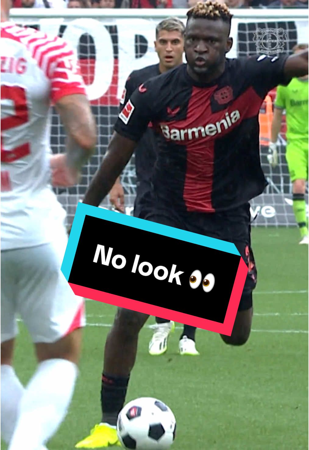 A post by @bayer04 on TikTok caption: @Boniface_jrn doesn’t need to see where the ball is going… 👀  #Bayer04 #Bundesliga 