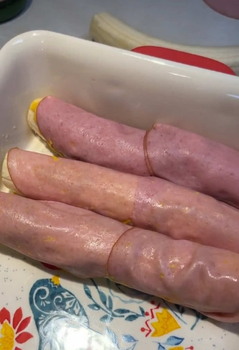 A post by @temptaetiontv on TikTok caption: #Stitch with @Josh & Momma Joanna and I need to talk…#fypシ゚viral #food #cooking #banana #bologna #reaction 