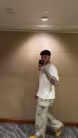 A post by @tristen.erickson3 on TikTok caption: Some fits from the week💚 @Feid #fyp #foryoupage #parati #fashion #fitcheck #fits #feid  @Onitsuka Tiger @New Balance @ASICS @acnestudiosofficial @SKIMS @H&M @neweracap @Akimbo @thenorthface @FEAR OF GOD 