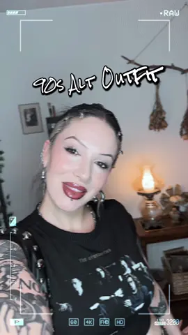 A post by @arachnisophia on TikTok caption: What are your favorite fashion eras or styles?? Mine will forever be: 90s alt, y2k fashion, and 90s alt goth mashups  Top and bag @Urban Outfitters  Pants @target  Shoes @Vans  Belt @hottopicofficial  #altedits #90slook #90salternative #altstyle #y2kfashion #90sfashion #altgoth #altfashion 