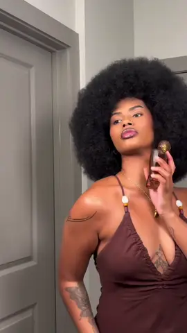 A post by @iamtabithabrown on TikTok caption: When the FRO matches the bottle!!!!  You did that @delilah ❤️ #tabithabrown #tabandchance #spreadlove #fragrance