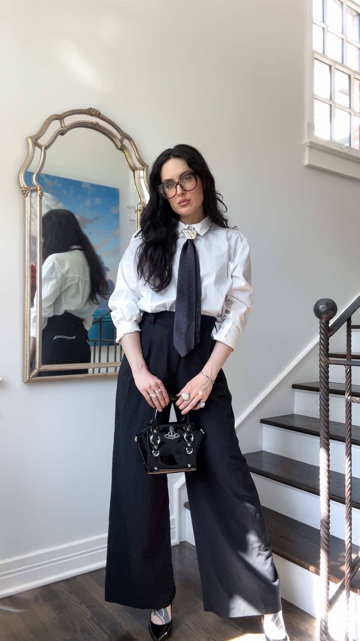 A post by @livvwilde__ on TikTok caption: Just the neighborhood business man.  Tie shield of dreams: @ZWYRTECH   Trousers: @Mary Wyatt 