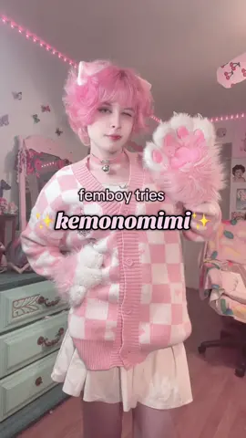 A post by @strawbabyboy on TikTok caption: i’ve been wanting to try it for a while and i fonally got ears and a tail :3✨ #femboy #fyp #femboytiktok #pink #kawaii #strawberry #fypシ #femboyfriday #kemonomimi 