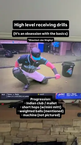 A post by @catchingmadesimple on TikTok caption: This is the process that turned the Coastal Carolina catcher into one of the best defensive catchers in the nation🔥 Cool to see @joe__singley get a shoutout from the announcers too as they break down @caden_bodine pre game progressions The receiving progression: - Indian club / mallet - short hops (w/mini mitt) - weighted balls (mentioned) - machine (not pictured) Every catcher NEEDS to watch this! 💯 #baseball #softball #cws #mcws