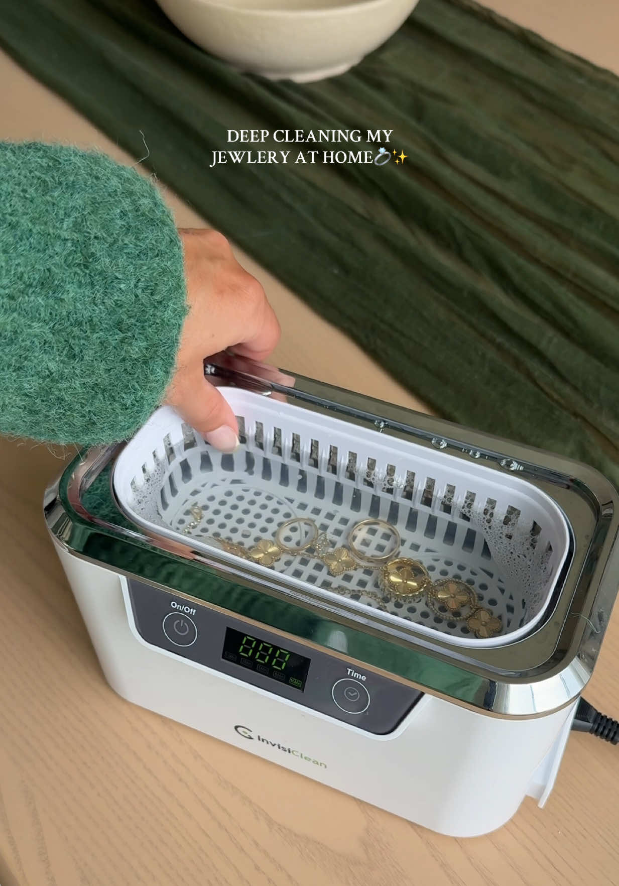 A post by @kaelimaee on TikTok caption: i’ve been using this machine for about a year now it works WONDERS✨💍👏🏼 #jewlerycleaner #clean #weddingband #weddingring #ringcleaner #asmr #asmrsounds #aesthetic #fyp #viral 