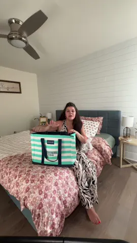 A post by @sociallykylie on TikTok caption: IT’S TIME!!!! 🥹🩷  #giftbasket #guestgifts #vlog #shoppinghaul #giftbag #familyvisit #brotherandsister 