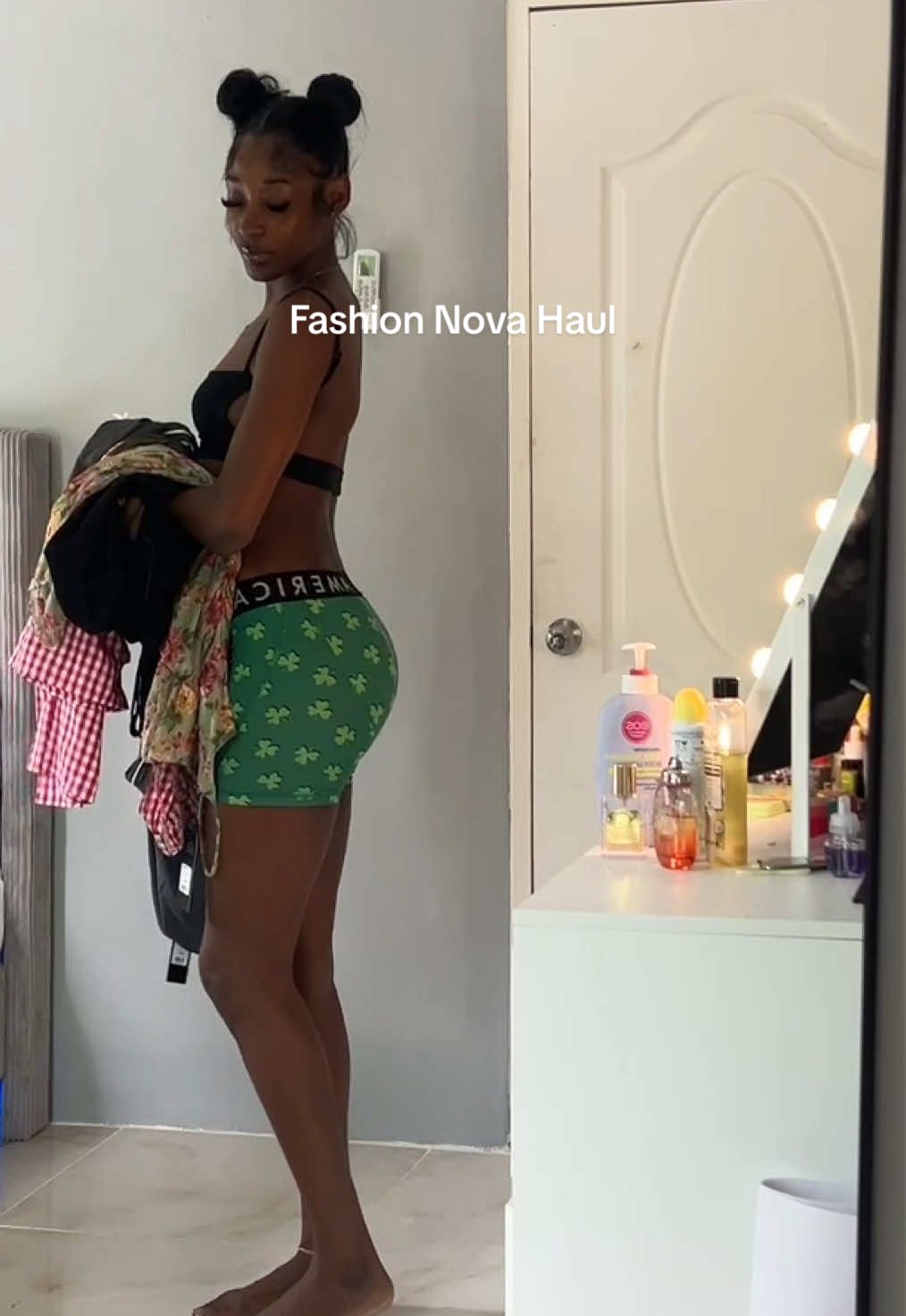 A post by @zaneaaaliyah on TikTok caption: Obsessed with everything 😍  @Fashion Nova  Trina Windbreaker Track Pant  Ballet Core Poplin Bubble Mini Dress Floral Mesh Mini Dress  Strappy But Classy Faux Leather Mini Skirt Vida Faux Suede Micro Trouser Short Cruise Along Gingham Boxer Pant  Lillie Sandals  Carina Wrap Up Heels  #haul #fashionnova 