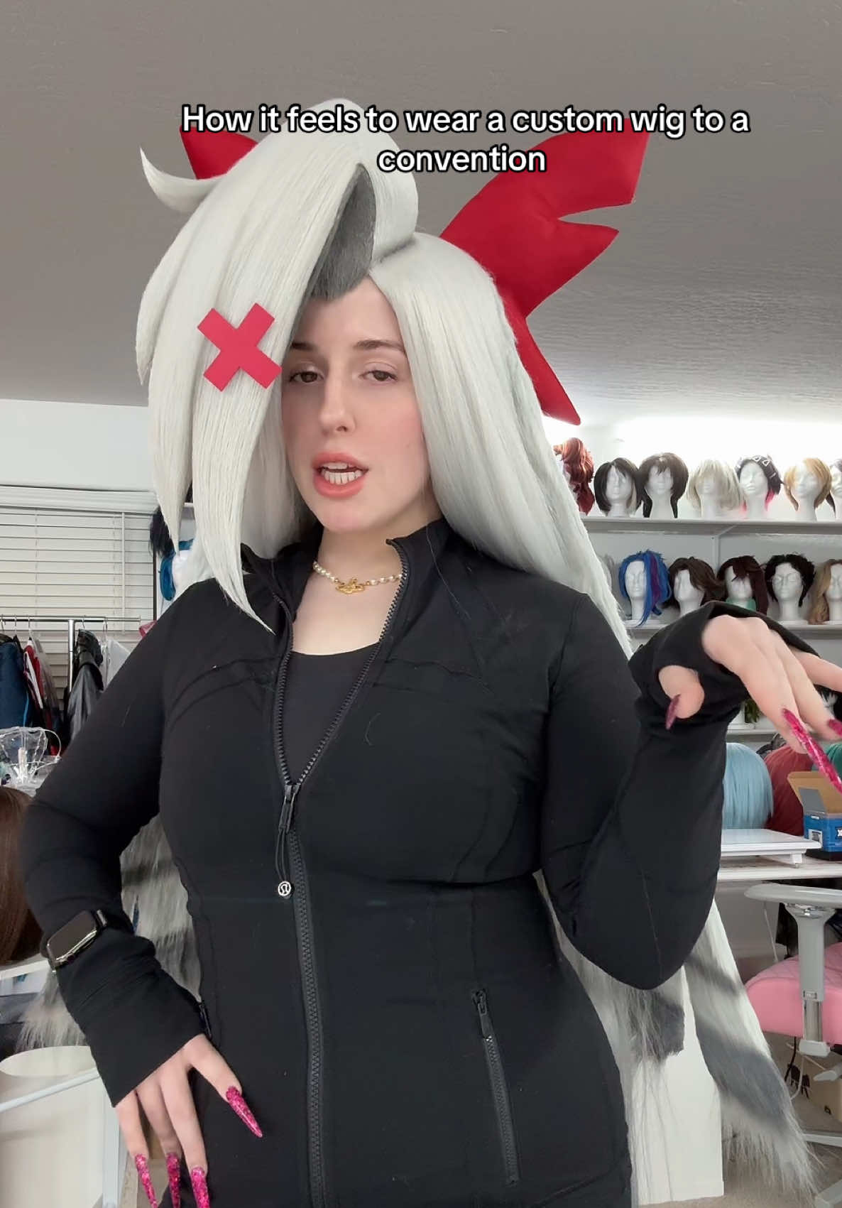 A post by @umbrawigs on TikTok caption: Seldom do I cosplay , but when I have the chance to wear one of my own wigs, or a costume a friend made for me, I feel soooo fancyyyy and cooool. The amount of wigs I part with where I think “dang…. I want this” is all the time . I miss my children hahaha  . #wigcommission #wigstyling #cosplaywig #cosplaywigstyling #wigs #wigmaker #hazbin #hazbinhotel #vaggie #vaggiecosplay #hazbinhotelcosplay 