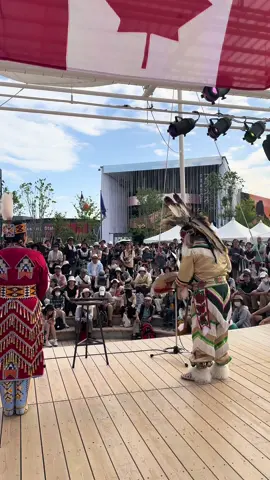 A post by @ on TikTok caption: One of our performances here at the Osaka Expo 2025 🇯🇵✨ I danced jingle while my husband Joel Wood sang and showcased his beautiful voice with songs he composed himself. He even grass danced! We’re so happy to be here sharing our culture, our joy, and our love for who we are as Native people. This is just the beginning, more shows to come! Wopila tanka to everyone back home supporting us. We wanted to bring you along and show you what we’re doing out here 🌎❤️ @JoelWood  #ToniaJoHall #JoelWood #OsakaExpo2025 #JingleDressDancer #GrassDancer #NativeLove #IndigenousExcellence