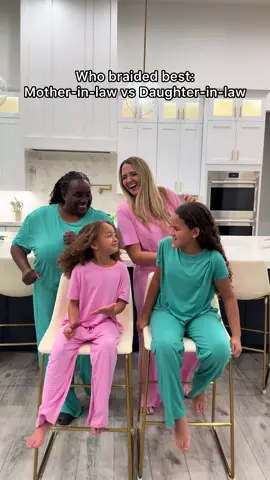 A post by @fluellenfam on TikTok caption: Learned from the best but am I better?🤪 Vote in the comments 👀😂 #braids #braiddesigns #motherinlaw #daughterinlaw #braidinspo 