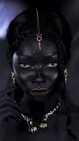 A post by @nyane on TikTok caption: Let’s do my makeup 🖤 BLACK PANTHER 🖤 this is the last and final look from my Wild series.. lmk your thoughts on the look❕ Used @Huda Beauty eyeliner and wild jaguar palette on my eyes, I wish I had a better black paint for my body, but still happy with the look xx #blackpanthermakeup #foryoupage #letsdomymakeup #jaguar 